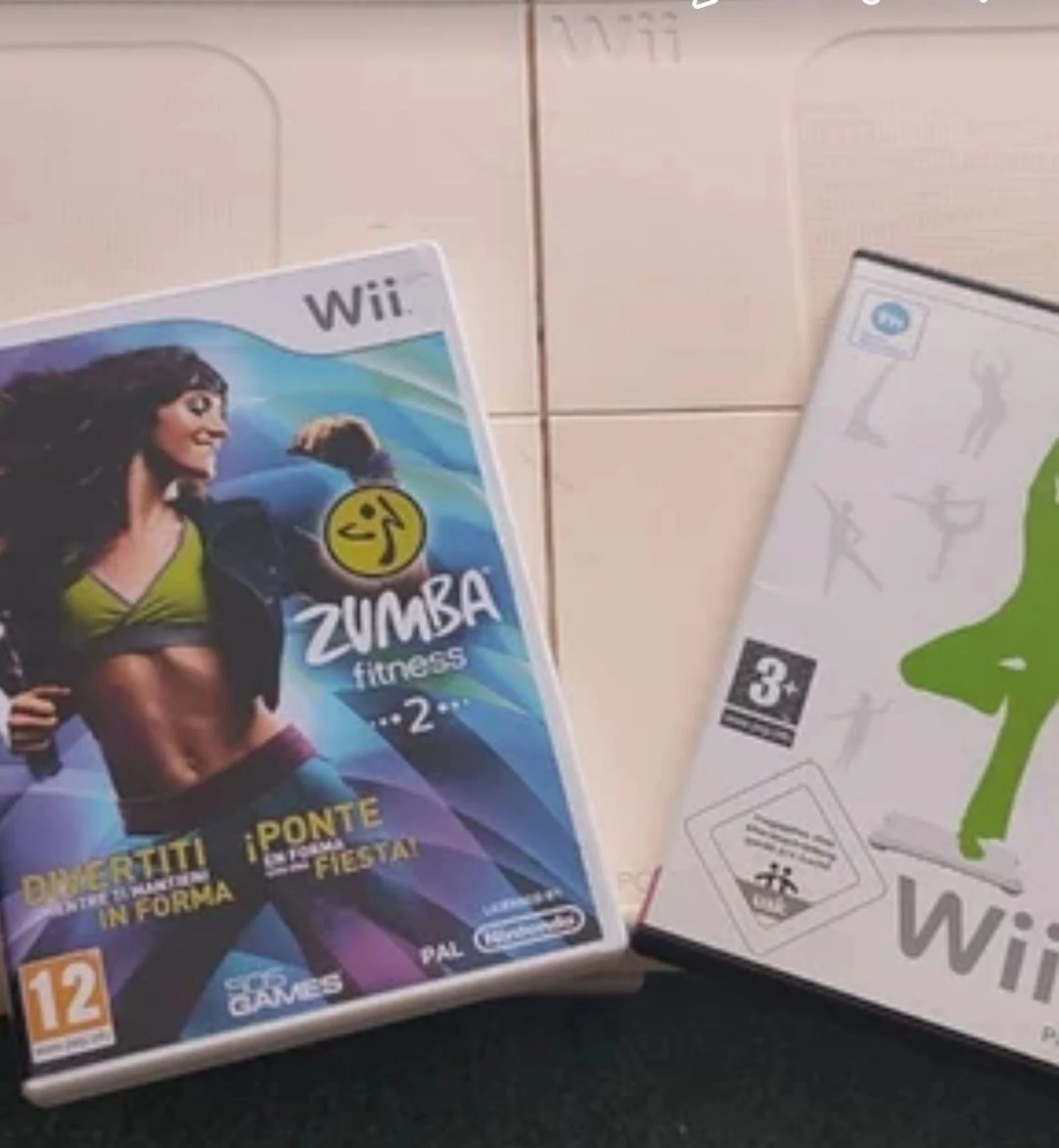 Tabla Wii fit y 2 juegos 